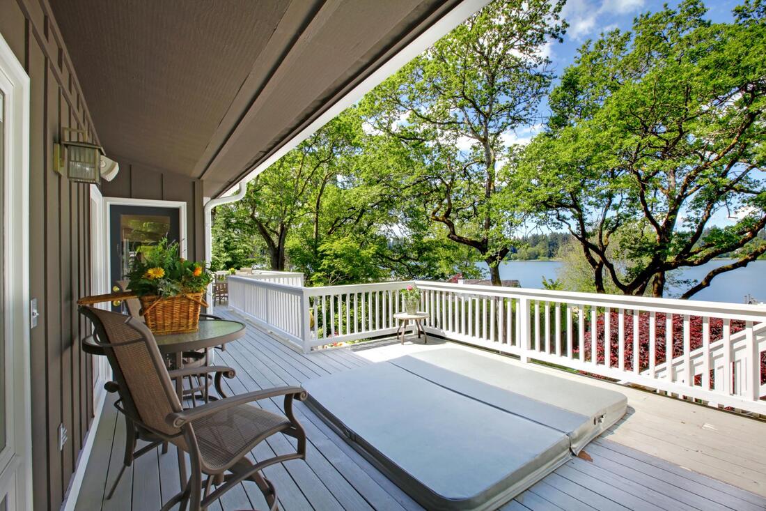 composite deck with beach front, deck builder, deck repairs, best deck building company near me, fredericton nb